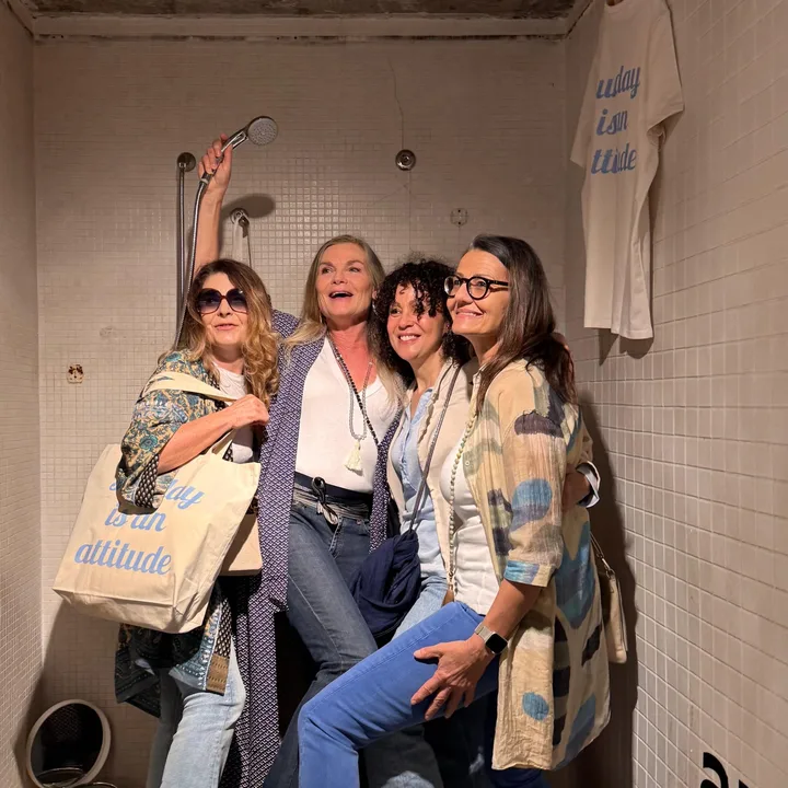 Four friends in the SDS shower photo booth